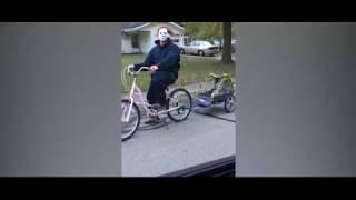 Mom Berates Husband After she Catches him Riding a Bike Dressed as MICHAEL MYERS in Hilarious Clip