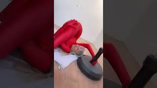 How to get into the inverted dimarioknot whilst wearing a red catsuit and using a parasol as prop 