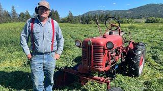 Making hay with Farmall Cub and  small round baler