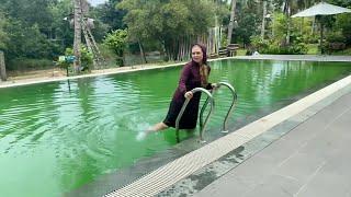 White Nike sneakers, purple dress, green water • Wetlook girl swimming in pool • Wet dress