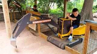 Kids Playing with Mini Ride-On Excavators