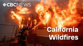 Overnight L.A. wildfire footage shows cars abandoned, homes destroyed