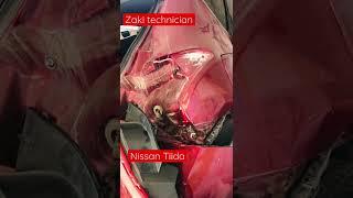 Nissan tiida back accident repair work zaki technician auto expert expert automotive