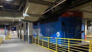 Metra 109 sits at a Union station platform