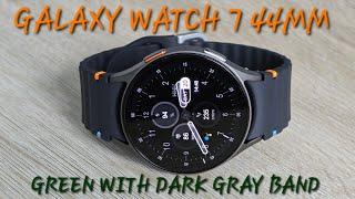 Samsung Galaxy Watch 7 44mm  green with dark gray band.