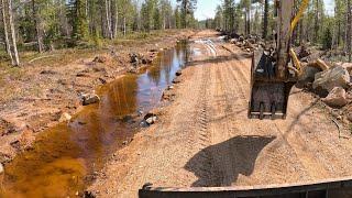 Blasting and digging to clear restricted water flow