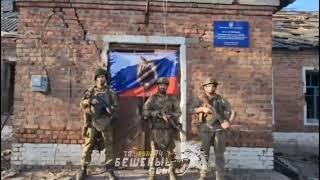 Raising the Russian flag in the liberated settlement of "Krasny yar".