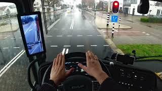 Nikotimer Driving Container to port POV rainy day video Trucking job Europe Netherlands