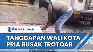 Viral Video Aksi Pria di Ambon Hancurkan Trotoar Pakai Palu, Ini Tanggapan Wali kota dan Pemrov