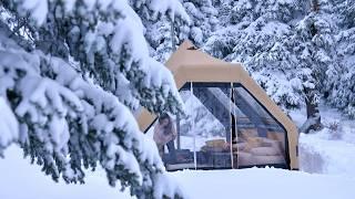 LUXURIOUS AND COMFORTABLE TENT CAMPING IN A SNOW-COVERED FOREST