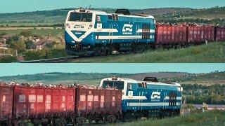 Грузовой поезд с металлоломом. Тепловозы TE33AC-3012 / Толкач TE33AC-3001. Бессарабка