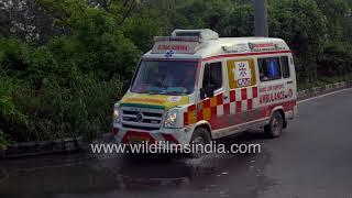 Ambulances navigate traffic to get to two of the busiest hospitals of Delhi