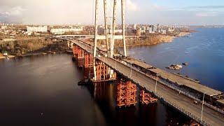 Запорожский мост. Работы под пролетами моста. Опускание пролетного строения в проектное положение