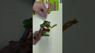 Opening haribo twin snake candy sweet and sour