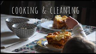 18. Cooking homemade lasagna and doing houseworks 