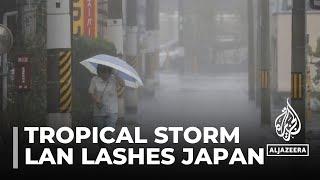 Tropical storm Lan lashes Japan, disrupts holiday travel