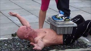 Amazing Fakir and Acrobat Street Performer. Turin, Italy