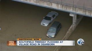 Southfield Freeway flooded at Village Road in Dearborn