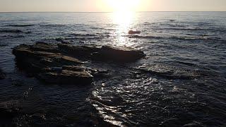 Morning Sun salutation, Sardinian beach.