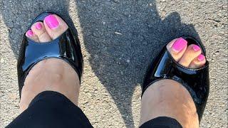 Goddess Angela Athena is live in her black high heels mules in public