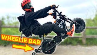 Unlock Your Wheelie Skills: EBOX Dragster Mini Bike and Wheelie Bar Review!