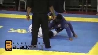 Felipe Costa taking the back from deep half guard