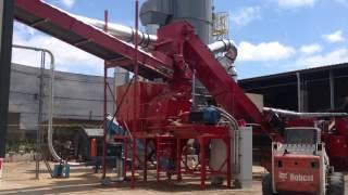 Dem-Con's EC266 horizontal grinder in action