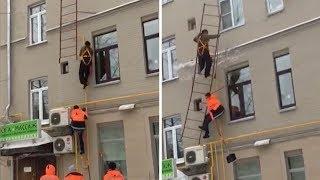 Ladder Breaks And Falls Off Wall As Workers Climb