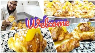 preparing a perennial croissant with patisserie cream and peaches