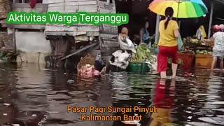 Kalimantan Barat: Banjir Roob Mengganggu Aktivitas Warga Pasar Sungai Pinyuh