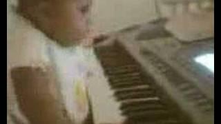 5mos.old baby girl Sydnei play her own gospel tune!