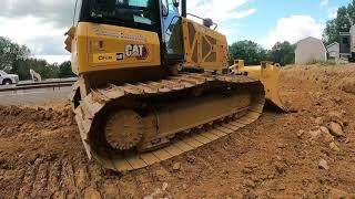 Dozer cutting grade on site work project