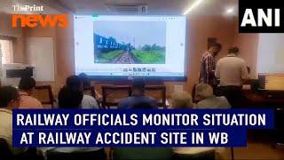 Indian Railway officials monitor  situation at the accident site in West Bengal