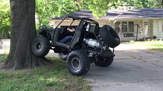 Brakes work!!! Rob climbing a tree in my Zuk!