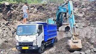 sand mining || excavator working loading small rocks into dump truck - 4k