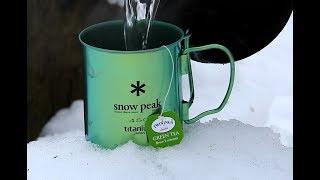 A Tea Cup on Snow Gets Hot Water for Show