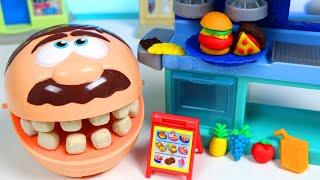 Mr. Play Doh Head Eats at the Toy Hamburger Restaurant!