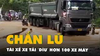 Video tài xế xe tải 'dìu' hơn 100 xe máy qua đoạn đường nước chảy xiết