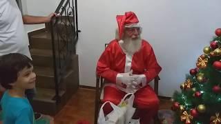 Papai Noel entregando presentes - Natal 2019