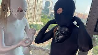 Two girl in zentai and stunning maskFunny behind the scenes 