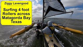 Double digit speeds Sailing 4 footers in my Windrider 17.