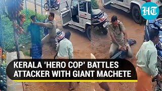Kerala cop fights man holding a giant machete; Video goes viral, netizens applaud 'hero'