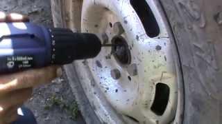 Способ откручивания прикипевшей гайки ступицы колеса в ВАЗ
