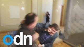 Ukrainian politicians get into fist fight outside parliament chambers