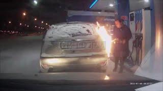 Woman  lights pump on fire at gas station (Fail!)