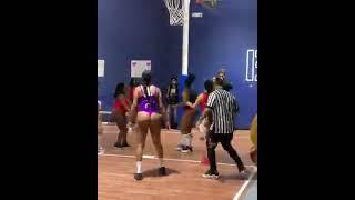 big booty females half naked playing each other in basketball