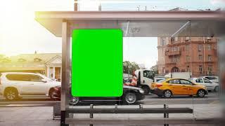 Green Screen billboard with a green screen on a busy street