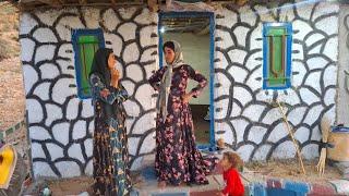 Daily life of Farhanaz nomadic family.  Farhanaz takes some sheep's milk for Zulfa and Aida #Zulfa