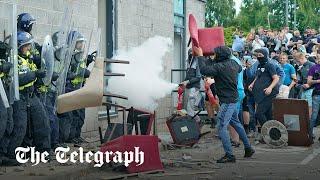 Anti-immigration protesters smash through migrant hotel in Rotherham