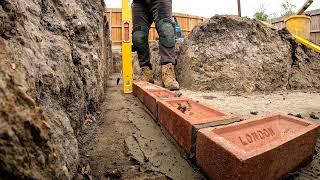 HOW TO LAY A TRADIONAL BRICK CORNER IN THE FOOTINGS